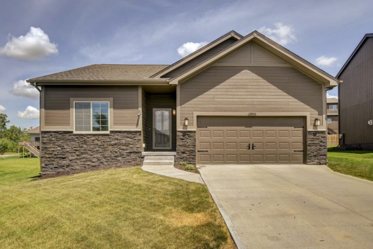 Front view of the house with garage view